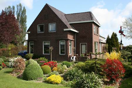 Huize de Haan, met tuin, aan de Langestraat Zuid 
